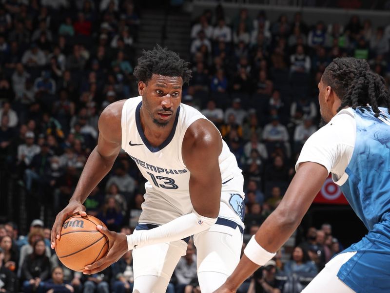 MINNEAPOLIS, MN -  FEBRUARY 28: Jaren Jackson Jr. #13 of the Memphis Grizzlies handles the ball during the game  on February 28, 2024 at Target Center in Minneapolis, Minnesota. NOTE TO USER: User expressly acknowledges and agrees that, by downloading and or using this Photograph, user is consenting to the terms and conditions of the Getty Images License Agreement. Mandatory Copyright Notice: Copyright 2024 NBAE (Photo by David Sherman/NBAE via Getty Images)