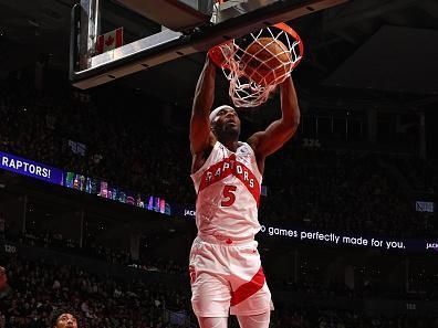 TORONTO, CANADA - DECEMBER 18:  Precious Achiuwa #5 of the Toronto Raptors dunks the ball during the game against the Charlotte Hornets on December 18, 2023 at the Scotiabank Arena in Toronto, Ontario, Canada.  NOTE TO USER: User expressly acknowledges and agrees that, by downloading and or using this Photograph, user is consenting to the terms and conditions of the Getty Images License Agreement.  Mandatory Copyright Notice: Copyright 2023 NBAE (Photo by Vaughn Ridley/NBAE via Getty Images)