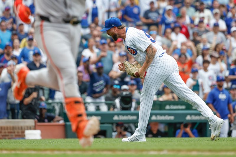 Jun 19, 2024; Chicago, Illinois, USA; Chicago Cubs relief pitcher Colten Brewer (54) reacts after delivering a final out against the San Francisco Giants during the ninth inning at Wrigley Field. Mandatory Credit: Kamil Krzaczynski-USA TODAY Sports