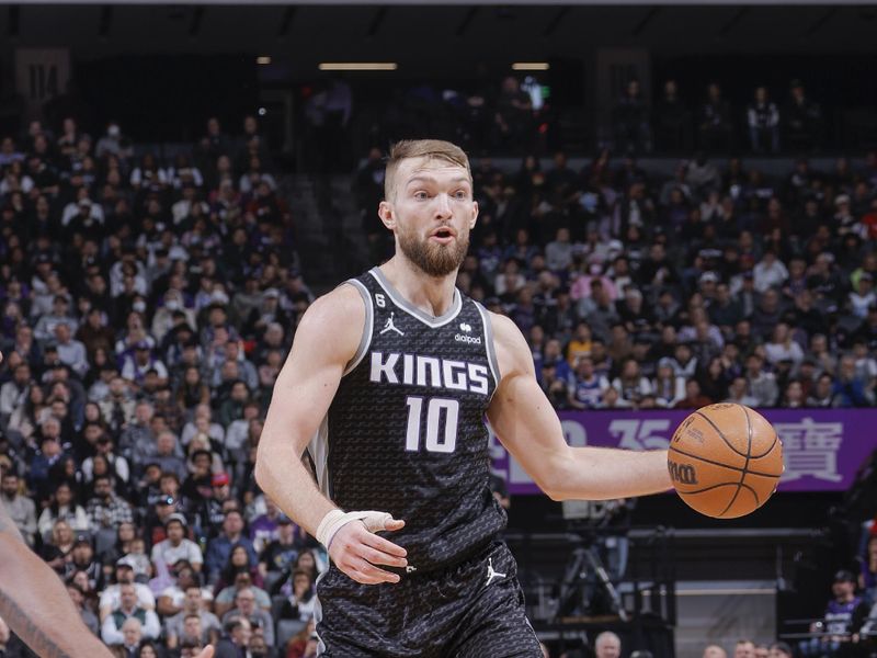 SACRAMENTO, CA - JANUARY 23:  Domantas Sabonis #10 of the Sacramento Kings drives to the basket during the game against the Memphis Grizzlies  on January 23, 2023 at Golden 1 Center in Sacramento, California. NOTE TO USER: User expressly acknowledges and agrees that, by downloading and or using this Photograph, user is consenting to the terms and conditions of the Getty Images License Agreement. Mandatory Copyright Notice: Copyright 2023 NBAE (Photo by Rocky Widner/NBAE via Getty Images)