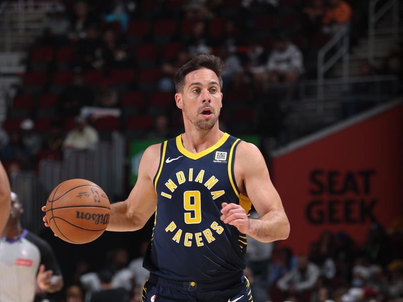 Cleveland, OH - OCTOBER 10: T.J. McConnell #9 of the Indiana Pacers dribbles the ball during the game against the Cleveland Cavaliers during a NBA pre season game on October 10, 2024 at Rocket Mortgage Fieldhouse in Cleveland, Ohio. NOTE TO USER: User expressly acknowledges and agrees that, by downloading and or using this photograph, User is consenting to the terms and conditions of the Getty Images License Agreement. Mandatory Copyright Notice: Copyright 2024 NBAE (Photo by Jeff Haynes/NBAE via Getty Images)