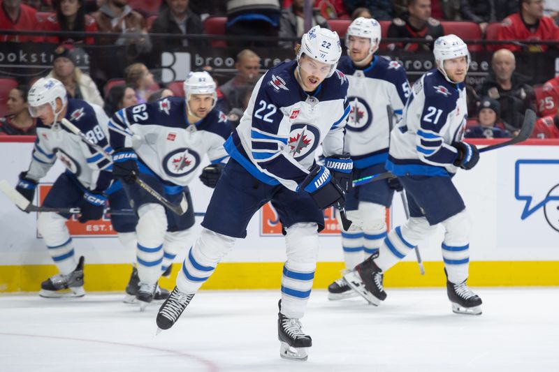 Jan 20, 2024; Ottawa, Ontario, CAN; Winnipeg Jets center Mason Appleton (22) skates to the bench after scoring a  goal scored in the second period against the Ottawa Senators at the Canadian Tire Centre. Mandatory Credit: Marc DesRosiers-USA TODAY Sports