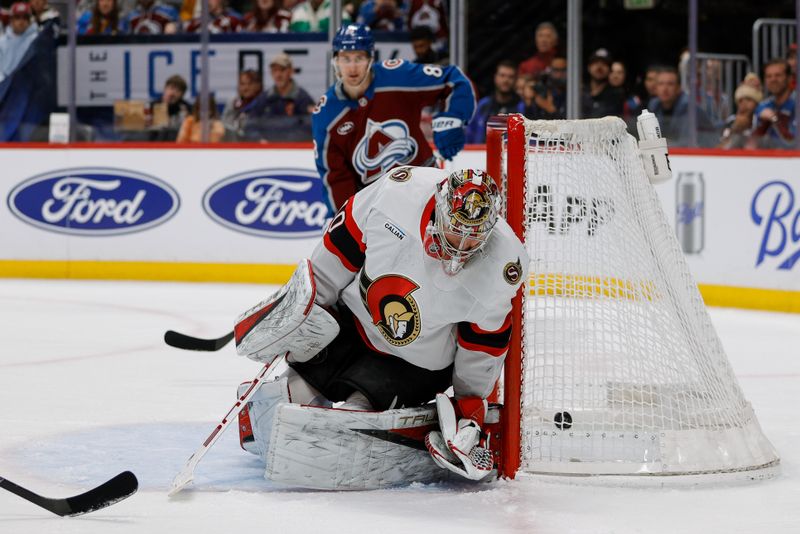 Jan 8, 2026; Denver, Colorado, USA; Ottawa Senators goaltender Mads Sogaard (40) is unable to stop a shot in the second period against the Colorado Avalanche at Ball Arena. Mandatory Credit: Isaiah J. Downing-Imagn Images