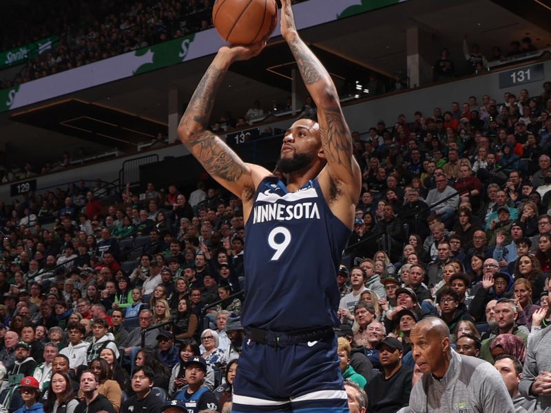 MINNEAPOLIS, MN -  MARCH 15:  Nickeil Alexander-Walker #9 of the Minnesota Timberwolves shoots a three point basket during the game  on March 15, 2023 at Target Center in Minneapolis, Minnesota. NOTE TO USER: User expressly acknowledges and agrees that, by downloading and or using this Photograph, user is consenting to the terms and conditions of the Getty Images License Agreement. Mandatory Copyright Notice: Copyright 2023 NBAE (Photo by David Sherman/NBAE via Getty Images)