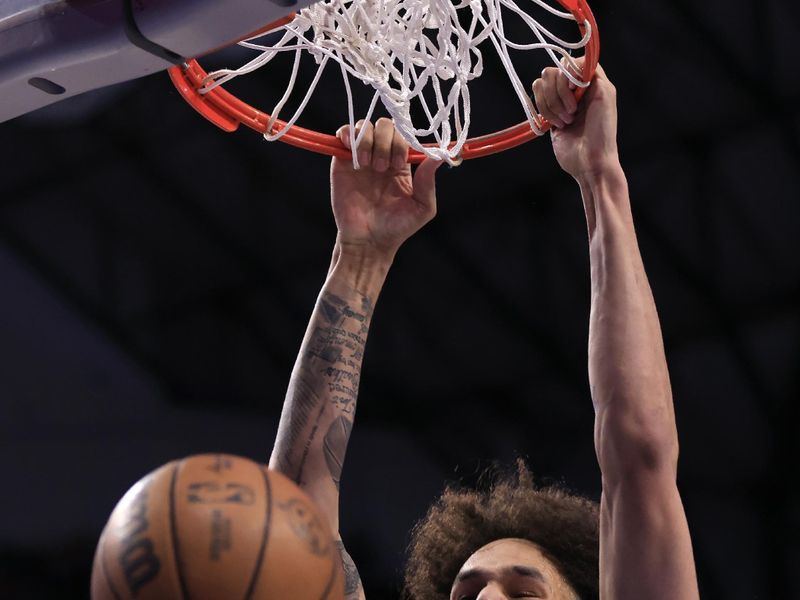 DALLAS, TX - JANUARY 27: Dereck Lively II #2 of the Dallas Mavericks   slam dunks against the Sacramento Kings in the second half at American Airlines Center on January 27, 2024 in Dallas, Texas. NOTE TO USER: User expressly acknowledges and agrees that, by downloading and or using this photograph, User is consenting to the terms and conditions of the Getty Images License Agreement. (Photo by Ron Jenkins/Getty Images)