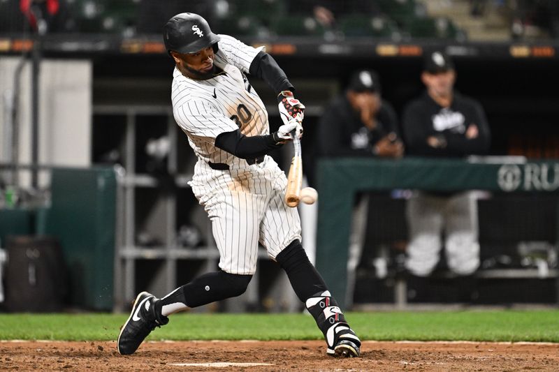 May 28, 2024; Chicago, Illinois, USA;  Chicago White Sox outfielder Corey Julks (30) grounds out in the seventh inning against the Toronto Blue Jays at Guaranteed Rate Field. Mandatory Credit: Jamie Sabau-USA TODAY Sports