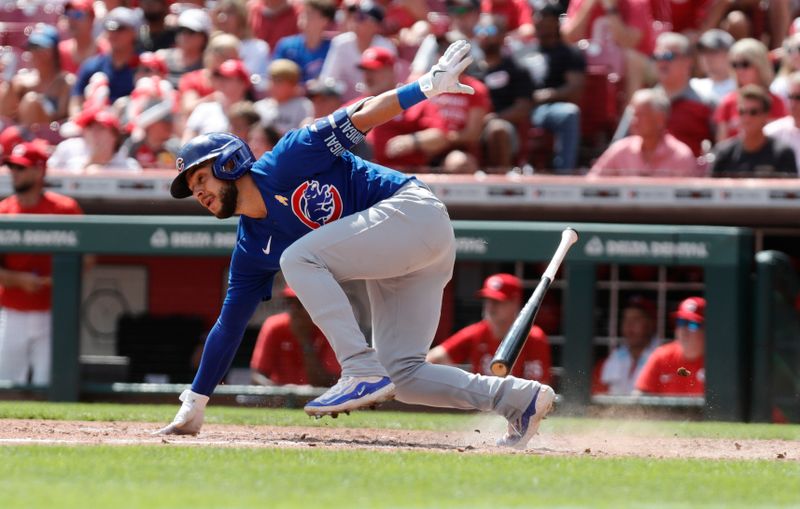 Sep 3, 2023; Cincinnati, Ohio, USA; Chicago Cubs third baseman Nick Madrigal (1) runs after hitting a two-run single against the Cincinnati Reds during the eighth inning at Great American Ball Park. Mandatory Credit: David Kohl-USA TODAY Sports