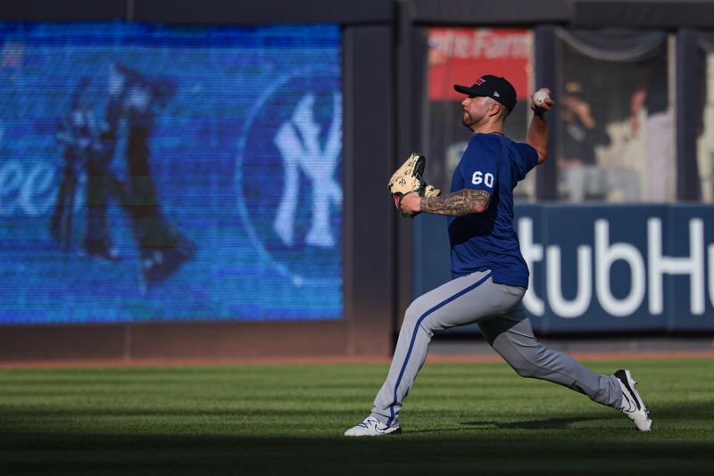 Sep 11, 2024; Bronx, New York, USA; Kansas City Royals relief pitcher Lucas Erceg (60) warms up during batting practice before the game against the New York Yankees at Yankee Stadium. Mandatory Credit: Vincent Carchietta-Imagn Images