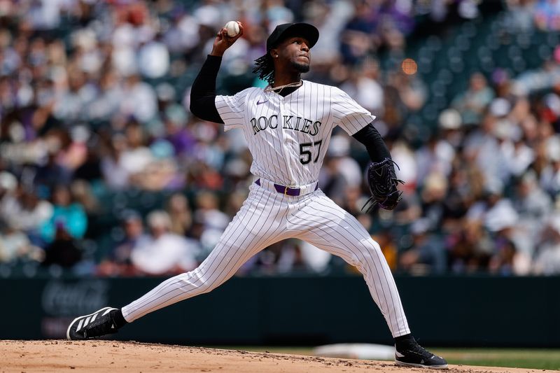 Apr 20, 2025; Denver, Colorado, USA; Colorado Rockies pitcher Angel Chivilli (57) pitches in the third inning against the Washington Nationals at Coors Field. Mandatory Credit: Isaiah J. Downing-Imagn Images
