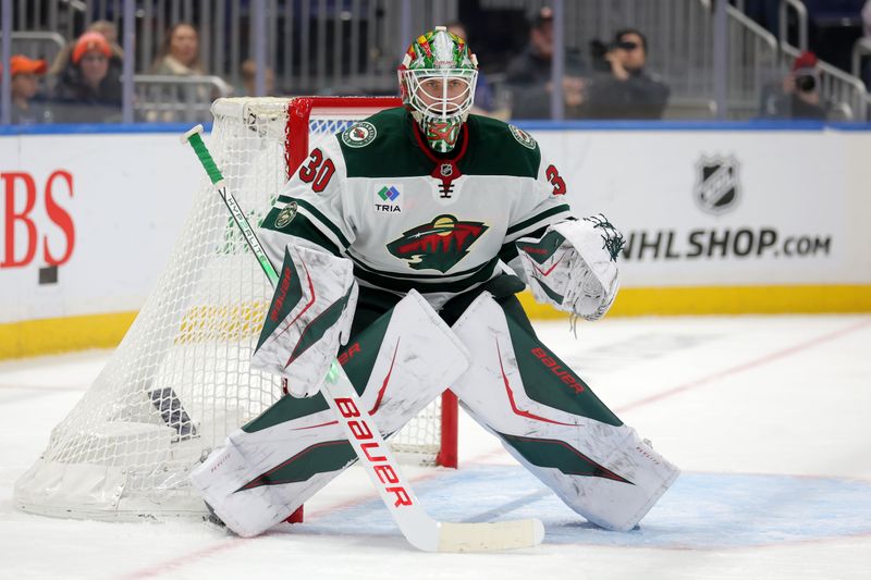 Nov 7, 2025; Elmont, New York, USA; Minnesota Wild goaltender Jesper Wallstedt (30) tends net against the New York Islanders during the second period at UBS Arena. Mandatory Credit: Brad Penner-Imagn Images