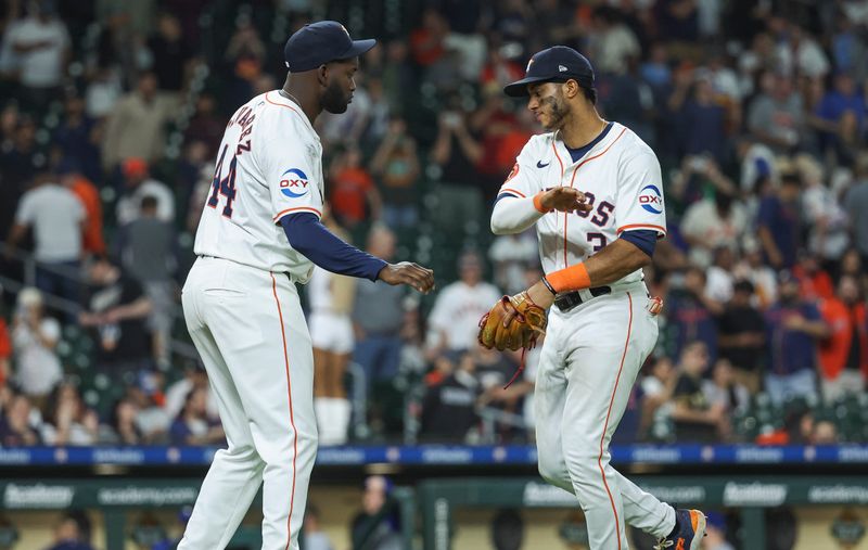 Apr 3, 2024; Houston, Texas, USA; Houston Astros left fielder Yordan Alvarez (44) celebrates with shortstop Jeremy Pena (3) after the game against the Toronto Blue Jays at Minute Maid Park. Mandatory Credit: Troy Taormina-USA TODAY Sports