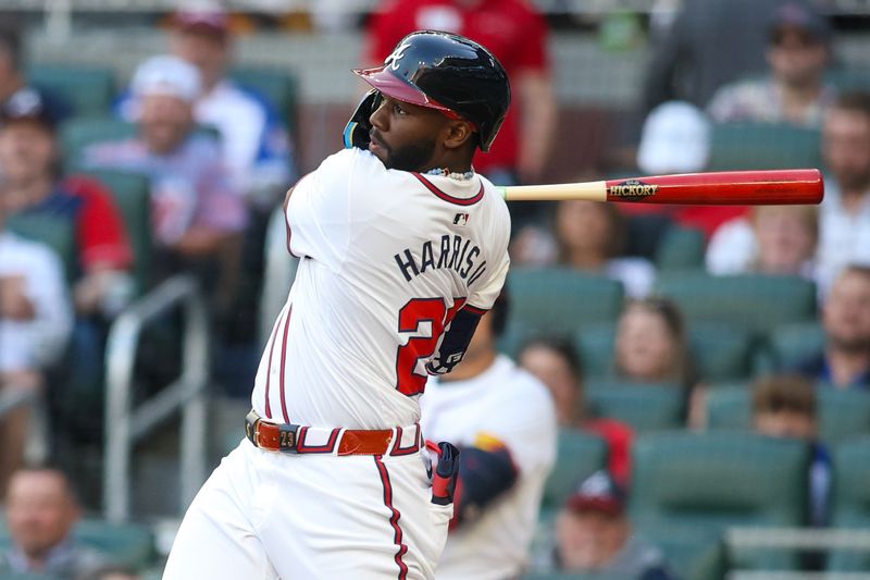 Apr 24, 2024; Atlanta, Georgia, USA; Atlanta Braves center fielder Michael Harris II (23) hits a single against the Miami Marlins in the first inning at Truist Park. Mandatory Credit: Brett Davis-USA TODAY Sports
