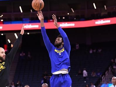 SAN FRANCISCO, CA - OCTOBER 23: Andrew Wiggins #22 of the Golden State Warriors warms up before the game against the Sacramento Kings on October 23, 2022 at Chase Center in San Francisco, California. NOTE TO USER: User expressly acknowledges and agrees that, by downloading and or using this photograph, user is consenting to the terms and conditions of Getty Images License Agreement. Mandatory Copyright Notice: Copyright 2022 NBAE (Photo by Noah Graham/NBAE via Getty Images)