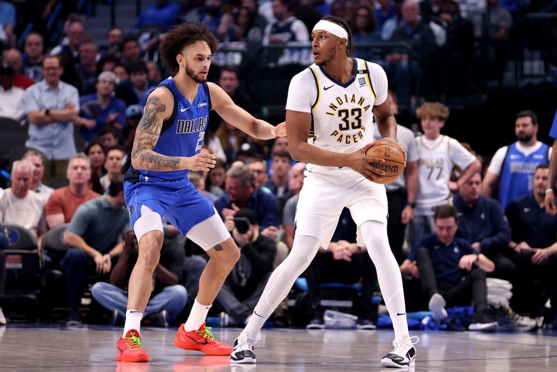 DALLAS, TEXAS - MARCH 05: Myles Turner #33 of the Indiana Pacers is guarded by Dereck Lively II #2 of the Dallas Mavericks in the first half in at American Airlines Center on March 05, 2024 in Dallas, Texas. NOTE TO USER: User expressly acknowledges and agrees that, by downloading and or using this photograph, User is consenting to the terms and conditions of the Getty Images License Agreement. (Photo by Tim Heitman/Getty Images)