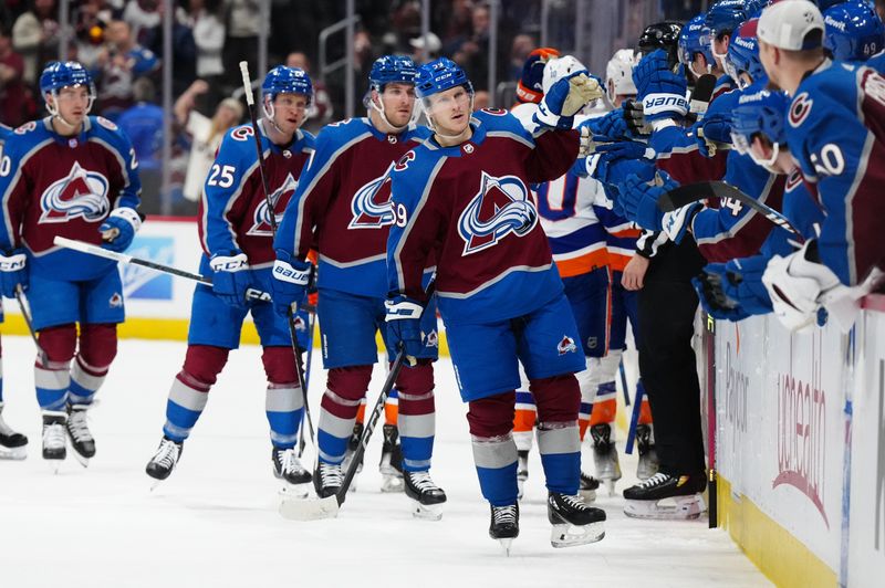 Jan 2, 2024; Denver, Colorado, USA; Colorado Avalanche center Ben Meyers (59) celebrates a goal scored in the first period against the New York Islanders  at Ball Arena. Mandatory Credit: Ron Chenoy-USA TODAY Sports