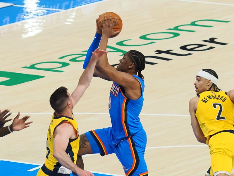 OKLAHOMA CITY, OK - JUNE 8: Jalen Williams #8 of the Oklahoma City Thunder drives to the basket during the game against the Indiana Pacers during Game Two of the 2025 NBA Finals on June 8, 2025 at Paycom Center in Oklahoma City, Oklahoma. NOTE TO USER: User expressly acknowledges and agrees that, by downloading and or using this photograph, User is consenting to the terms and conditions of the Getty Images License Agreement. Mandatory Copyright Notice: Copyright 2025 NBAE (Photo by Ron Hoskins/NBAE via Getty Images)