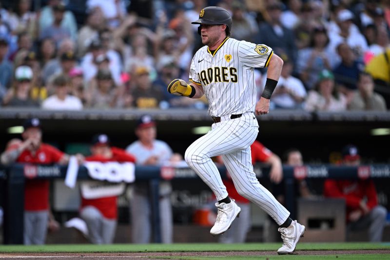 Jun 24, 2024; San Diego, California, USA; San Diego Padres second baseman Jake Cronenworth (9) advances home to score a run against the Washington Nationals during the second inning at Petco Park. Mandatory Credit: Orlando Ramirez-USA TODAY Sports