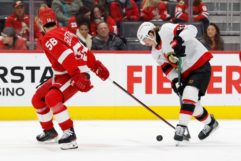 Jan 7, 2025; Detroit, Michigan, USA; Ottawa Senators right wing Adam Gaudette (81) skates with the puck defended by Detroit Red Wings defenseman Erik Gustafsson (56) in the third period at Little Caesars Arena. Mandatory Credit: Rick Osentoski-Imagn Images