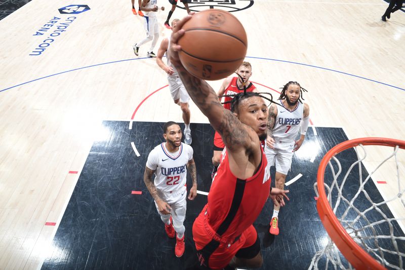 LOS ANGELES, CA - APIRL 14: Cam Whitmore #7 of the Houston Rockets dunks the ball during the game against the LA Clippers on April 14, 2024 at Crypto.Com Arena in Los Angeles, California. NOTE TO USER: User expressly acknowledges and agrees that, by downloading and/or using this Photograph, user is consenting to the terms and conditions of the Getty Images License Agreement. Mandatory Copyright Notice: Copyright 2024 NBAE (Photo by Adam Pantozzi/NBAE via Getty Images)