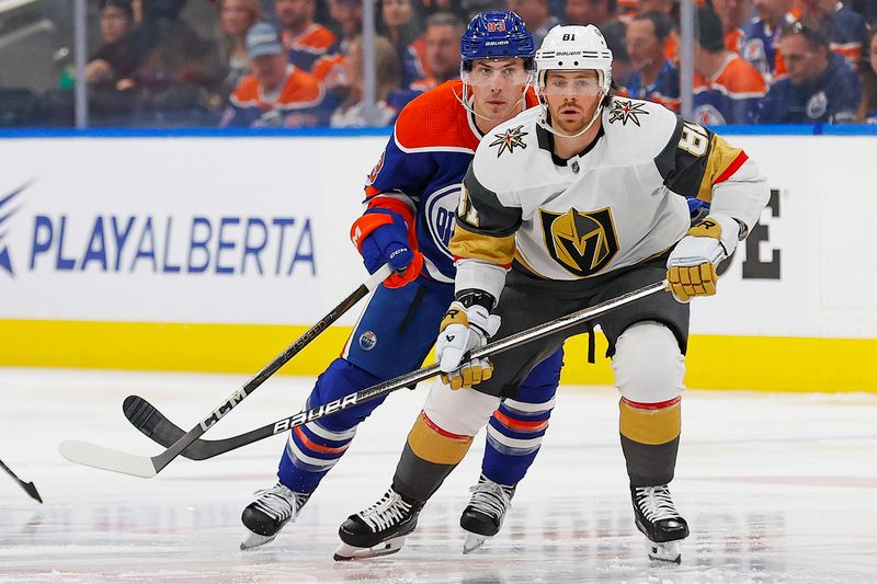 Apr 10, 2024; Edmonton, Alberta, CAN; Vegas Golden Knights forward Jonathan Marchessault (81) and Edmonton Oilers forward Ryan Nugent-Hopkins (93)look for a loose puck during the first period at Rogers Place. Mandatory Credit: Perry Nelson-USA TODAY Sports