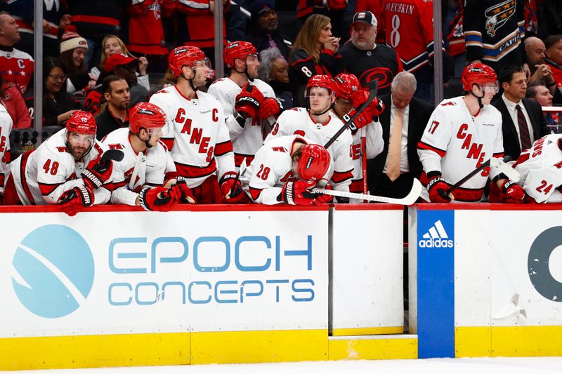 Mar 22, 2024; Washington, District of Columbia, USA; Carolina Hurricanes players react from the bench during a shootout against the Washington Capitals at Capital One Arena. Mandatory Credit: Amber Searls-USA TODAY Sports