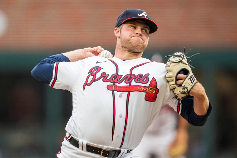 Aug 15, 2023; Cumberland, Georgia, USA; Atlanta Braves starting pitcher Bryce Elder (55) pitches against the New York Yankees during the first inning at Truist Park. Mandatory Credit: Dale Zanine-USA TODAY Sports