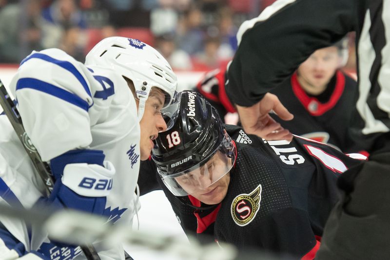 Dec 7, 2023; Ottawa, Ontario, CAN; Toronto Maple Leafs center David Kampf (64) faces off against Ottawa Senators center Tim Stutzle (18) in the first period at the Canadian Tire Centre. Mandatory Credit: Marc DesRosiers-USA TODAY Sports