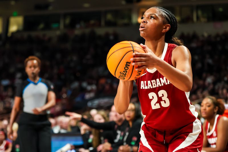 Feb 22, 2024; Columbia, South Carolina, USA; Alabama Crimson Tide guard Jessica Timmons (23) makes a three point basket against the South Carolina Gamecocks in the second half at Colonial Life Arena. Mandatory Credit: Jeff Blake-USA TODAY Sports