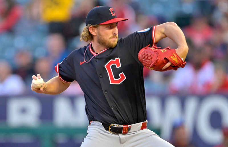 Apr 5, 2025; Anaheim, California, USA;  Cleveland Guardians starting pitcher Tanner Bibee (28) delivers to the plate in the first inning against the Los Angeles Angels at Angel Stadium. Mandatory Credit: Jayne Kamin-Oncea-Imagn Images