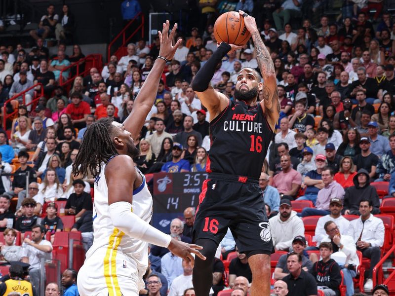 MIAMI, FL - MARCH 26: Caleb Martin #16 of the Miami Heat shoots the ball during the game against the Golden State Warriors on March 26, 2024 at Kaseya Center in Miami, Florida. NOTE TO USER: User expressly acknowledges and agrees that, by downloading and or using this Photograph, user is consenting to the terms and conditions of the Getty Images License Agreement. Mandatory Copyright Notice: Copyright 2024 NBAE (Photo by Jeff Haynes/NBAE via Getty Images)