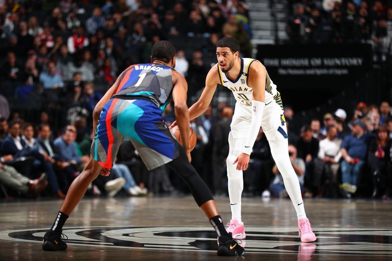 BROOKLYN, NY - APRIL 3: Tyrese Haliburton #0 of the Indiana Pacers dribbles the ball during the game against the Brooklyn Nets on April 3, 2024 at Barclays Center in Brooklyn, New York. NOTE TO USER: User expressly acknowledges and agrees that, by downloading and or using this Photograph, user is consenting to the terms and conditions of the Getty Images License Agreement. Mandatory Copyright Notice: Copyright 2024 NBAE (Photo by David L. Nemec/NBAE via Getty Images)