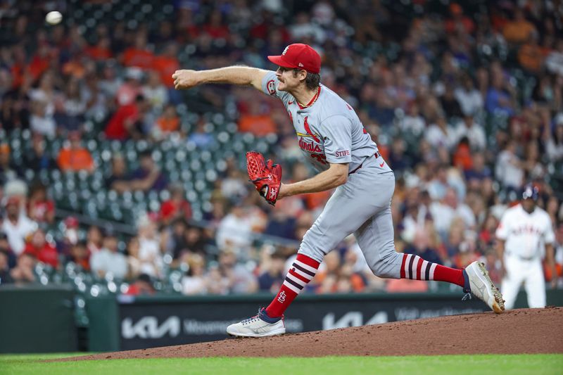 Jun 5, 2024; Houston, Texas, USA; St. Louis Cardinals starting pitcher Miles Mikolas (39) delivers a pitch during the first inning against the Houston Astros at Minute Maid Park. Mandatory Credit: Troy Taormina-USA TODAY Sports