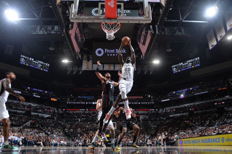 SAN ANTONIO, TX - APRIL 14: Sidy Cissoko #25 of the San Antonio Spurs dunks the ball during the game  against the Detroit Pistons on April 14, 2024 at the Frost Bank Center in San Antonio, Texas. NOTE TO USER: User expressly acknowledges and agrees that, by downloading and or using this photograph, user is consenting to the terms and conditions of the Getty Images License Agreement. Mandatory Copyright Notice: Copyright 2024 NBAE (Photos by Michael Gonzales/NBAE via Getty Images)