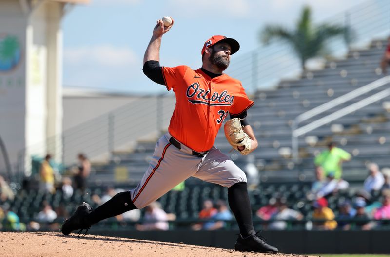 Feb 26, 2025; Bradenton, Florida, USA;  Baltimore Orioles pitcher Andrew Kittredge (39) throws a pitch during the third inning] against the Pittsburgh Pirates at LECOM Park. Mandatory Credit: Kim Klement Neitzel-Imagn Images