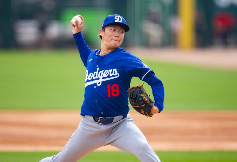 Mar 6, 2024; Phoenix, Arizona, USA; Los Angeles Dodgers pitcher Yoshinobu Yamamoto against the Chicago White Sox during a spring training baseball game at Camelback Ranch-Glendale. Mandatory Credit: Mark J. Rebilas-USA TODAY Sports