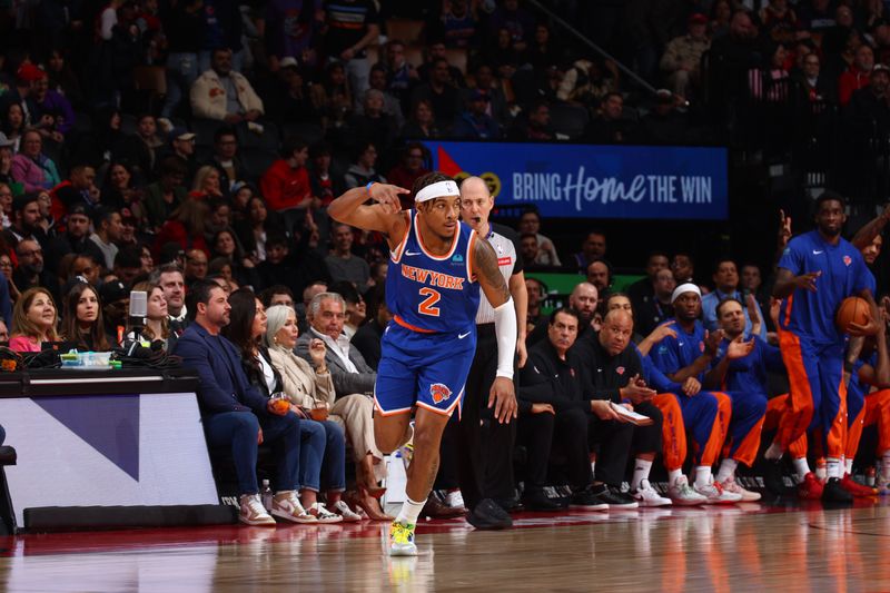 TORONTO, CANADA - MARCH 27: Miles McBride #2 of the New York Knicks celebrates during the game against the Toronto Raptors on March 27, 2024 at the Scotiabank Arena in Toronto, Ontario, Canada.  NOTE TO USER: User expressly acknowledges and agrees that, by downloading and or using this Photograph, user is consenting to the terms and conditions of the Getty Images License Agreement.  Mandatory Copyright Notice: Copyright 2024 NBAE (Photo by Vaughn Ridley/NBAE via Getty Images)