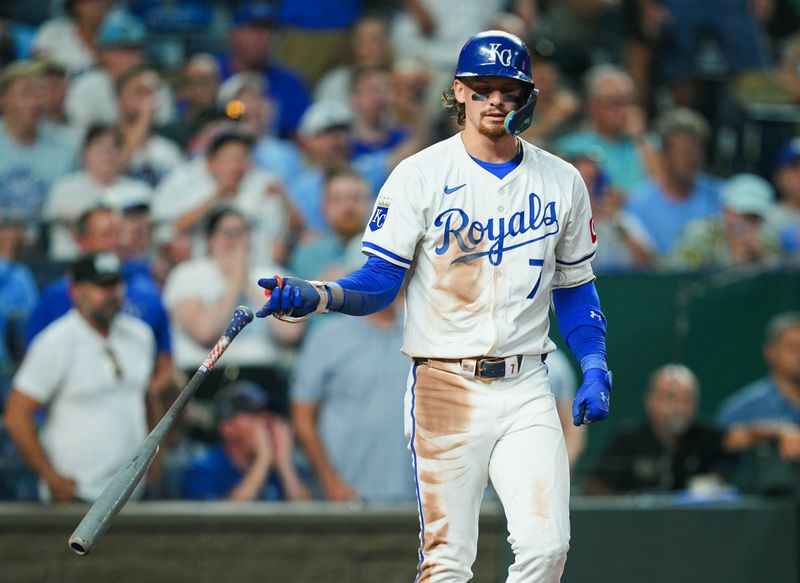 Jul 22, 2024; Kansas City, Missouri, USA; Kansas City Royals shortstop Bobby Witt Jr. (7) reacts after being hit by a pitch during the sixth inning against the Arizona Diamondbacks at Kauffman Stadium. Mandatory Credit: Jay Biggerstaff-USA TODAY Sports