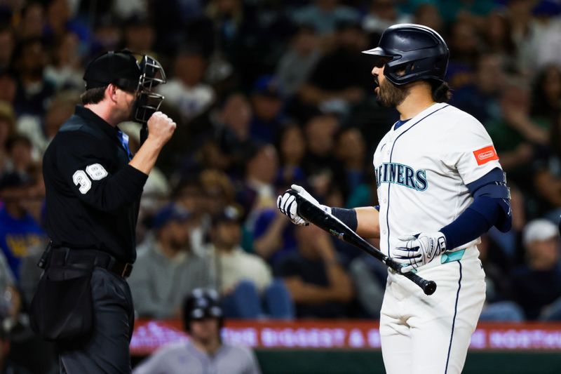 Sep 23, 2025; Seattle, Washington, USA; Seattle Mariners third baseman Eugenio Suarez (28) reacts after striking out swinging against the Colorado Rockies during the seventh inning at T-Mobile Park. Mandatory Credit: Joe Nicholson-Imagn Images