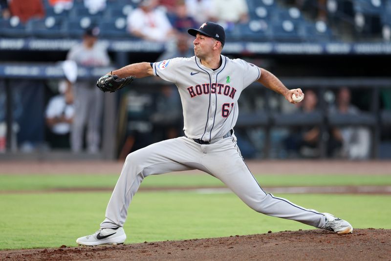 May 19, 2025; Tampa, Florida, USA; Houston Astros starting pitcher Colton Gordon (61) throws a pitch against the Tampa Bay Rays in the second inning at George M. Steinbrenner Field. Mandatory Credit: Nathan Ray Seebeck-Imagn Images
