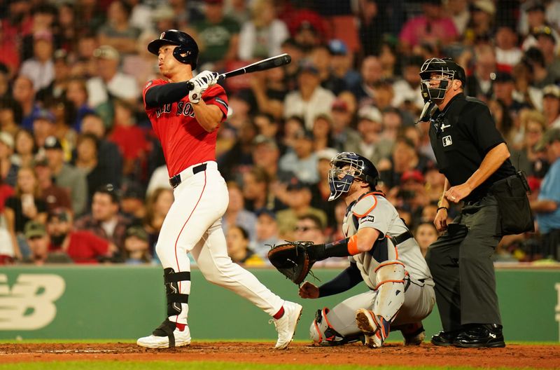 May 31, 2024; Boston, Massachusetts, USA; Boston Red Sox left fielder Rob Refsnyder (30) hits a double to drive in a run against the Detroit Tigers in the fifth inning at Fenway Park. Mandatory Credit: David Butler II-USA TODAY Sports