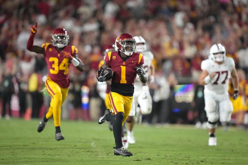 Sep 9, 2023; Los Angeles, California, USA; Southern California Trojans wide receiver Zachariah Branch (1) scores on a 50-yard punt return in the first half at United Airlines Field at Los Angeles Memorial Coliseum. Mandatory Credit: Kirby Lee-USA TODAY Sports