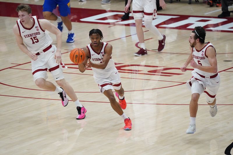 Feb 25, 2026; Stanford, California, USA;  Stanford Cardinal guard Ebuka Okorie (1) makes a pass as forward/center Oskar Giltay (15) and guard Benny Gealer (5) run upcourt against the Pittsburgh Panthers in the first half at Maples Pavilion. Mandatory Credit: David Gonzales-Imagn Images