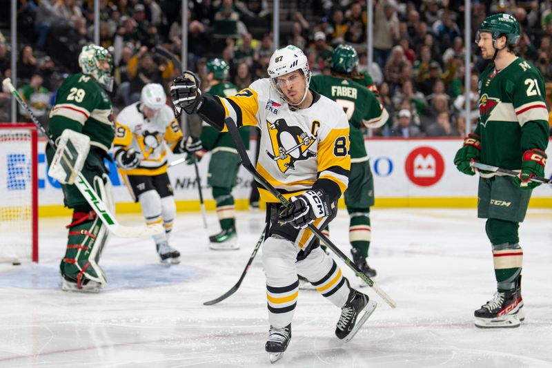 Feb 9, 2024; Saint Paul, Minnesota, USA; Pittsburgh Penguins center Sidney Crosby (87) celebrates a third period goal against Minnesota Wild at Xcel Energy Center. Mandatory Credit: Matt Blewett-USA TODAY Sports