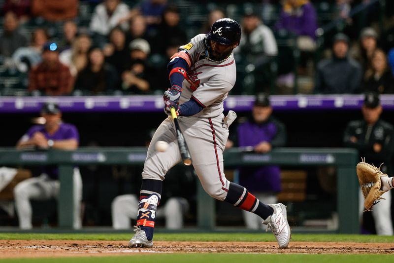 Apr 28, 2025; Denver, Colorado, USA; Atlanta Braves center fielder Michael Harris II (23) hits a two RBI double in the fifth inning against the Colorado Rockies at Coors Field. Mandatory Credit: Isaiah J. Downing-Imagn Images