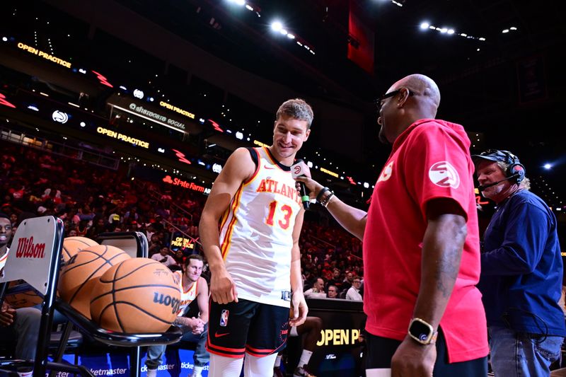 ATLANTA, GA - OCTOBER 16: The Atlanta Hawks Open Practice on October 16, 2024 at State Farm Arena in Atlanta, Georgia.  NOTE TO USER: User expressly acknowledges and agrees that, by downloading and/or using this Photograph, user is consenting to the terms and conditions of the Getty Images License Agreement. Mandatory Copyright Notice: Copyright 2024 NBAE (Photo by Adam Hagy/NBAE via Getty Images)