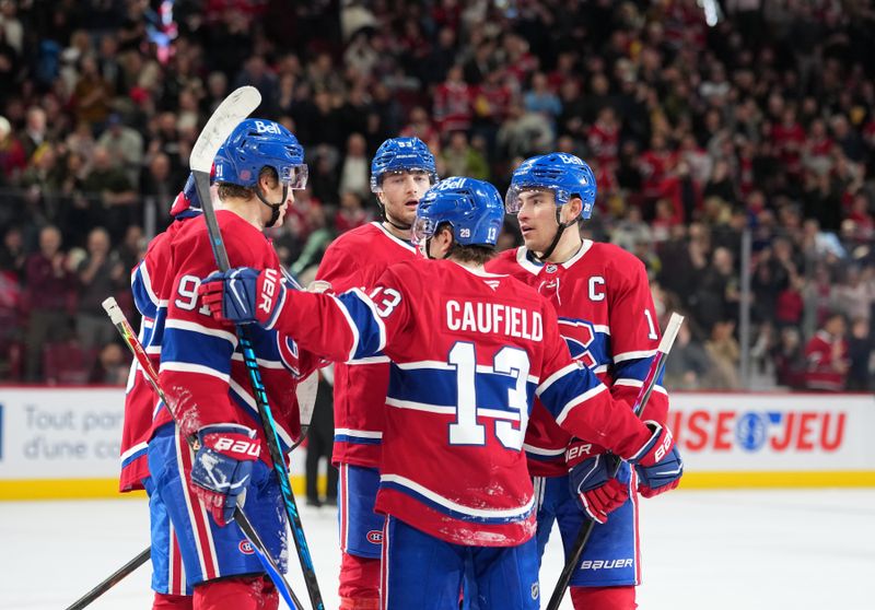 Dec 9, 2025; Montreal, Quebec, CAN; Montreal Canadiens forward Oliver Kapanen (91) celebrates with teammates after scoring a goal against the Tampa Bay Lightning during the second period at the Bell Centre. Mandatory Credit: Eric Bolte-Imagn Images