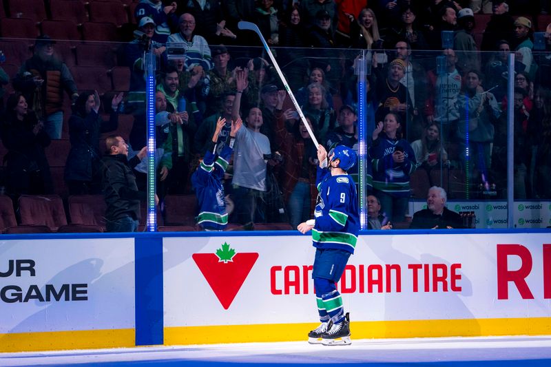 Nov 12, 2024; Vancouver, British Columbia, CAN; Vancouver Canucks forward J.T. Miller (9) gives a stick to a fan for being named the game’s third star after the Canucks defeated the Calgary Flames at Rogers Arena. Mandatory Credit: Bob Frid-Imagn Images