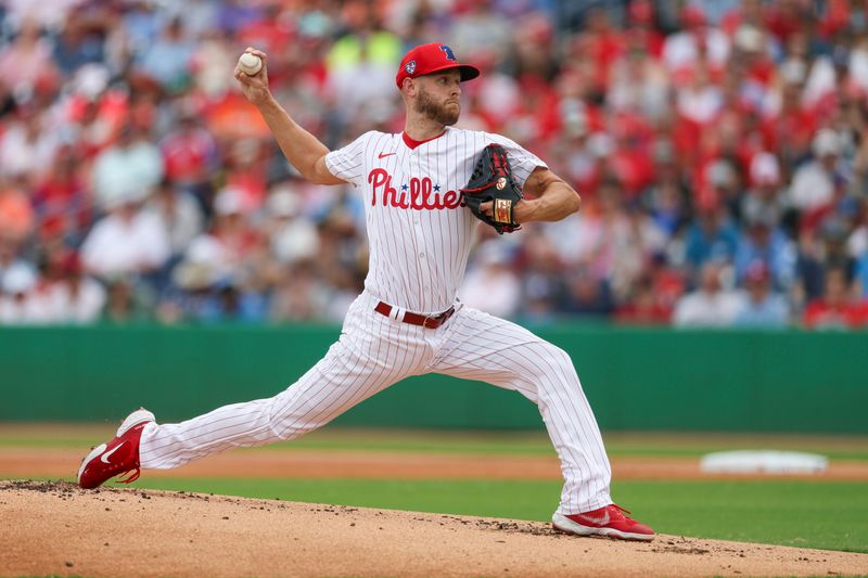 Mar 5, 2024; Clearwater, Florida, USA;  Philadelphia Phillies starting pitcher Zack Wheeler (45) throws a pitch against the Baltimore Orioles in the first inning at BayCare Ballpark. Mandatory Credit: Nathan Ray Seebeck-USA TODAY Sports