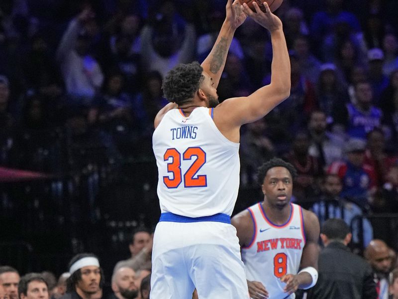 PHILADELPHIA, PA - NOVEMBER 12: Karl-Anthony Towns #32 of the New York Knicks shoots a three point basket during the game against the Philadelphia 76ers during the Emirates NBA Cup game on November 12, 2024 at the Wells Fargo Center in Philadelphia, Pennsylvania NOTE TO USER: User expressly acknowledges and agrees that, by downloading and/or using this Photograph, user is consenting to the terms and conditions of the Getty Images License Agreement. Mandatory Copyright Notice: Copyright 2024 NBAE (Photo by Jesse D. Garrabrant/NBAE via Getty Images)