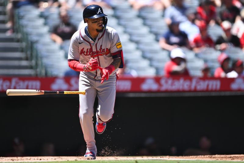 Aug 18, 2024; Anaheim, California, USA; Atlanta Braves shortstop Orlando Arcia (11) flies out against the Los Angeles Angels during the second inning at Angel Stadium. Mandatory Credit: Jonathan Hui-USA TODAY Sports